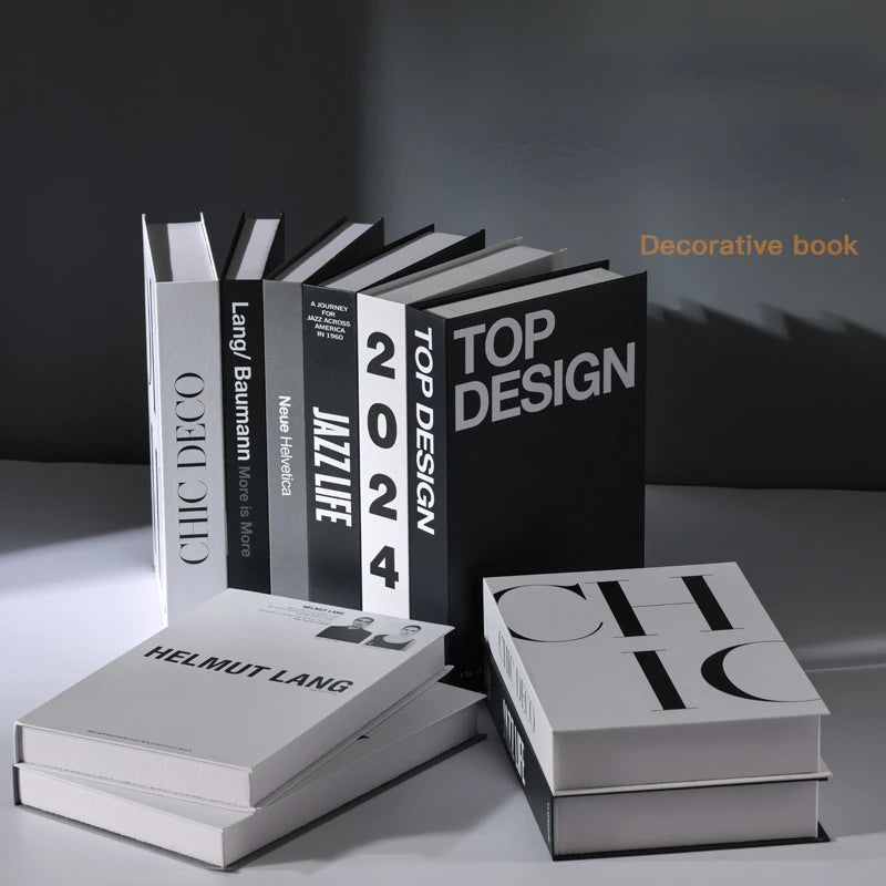 Stylish decorative books: Chic Deco, Top Design, Helmut Lang. Modern home decor & luxury interior design accents.