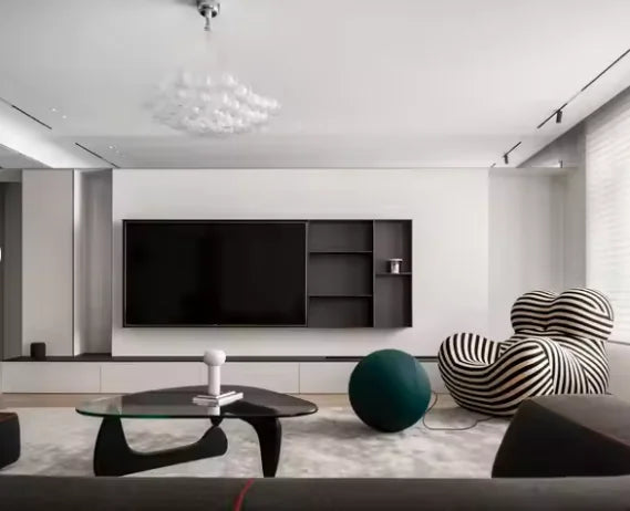 Modern Living Room with Wall-Mounted TV Cabinet, Designer Chair, and Cloud Chandelier