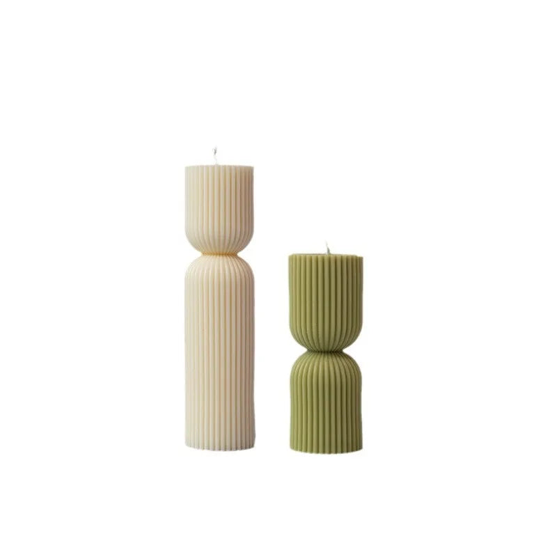 Striped pillar candles: White and green soy wax scented candles for home decor.