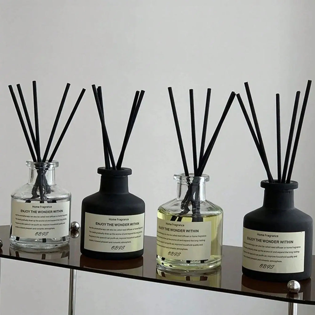 Modern Home Fragrance Reed Diffusers: Black and Clear Glass Bottles with Aromatic Oils for Stylish Home Decor