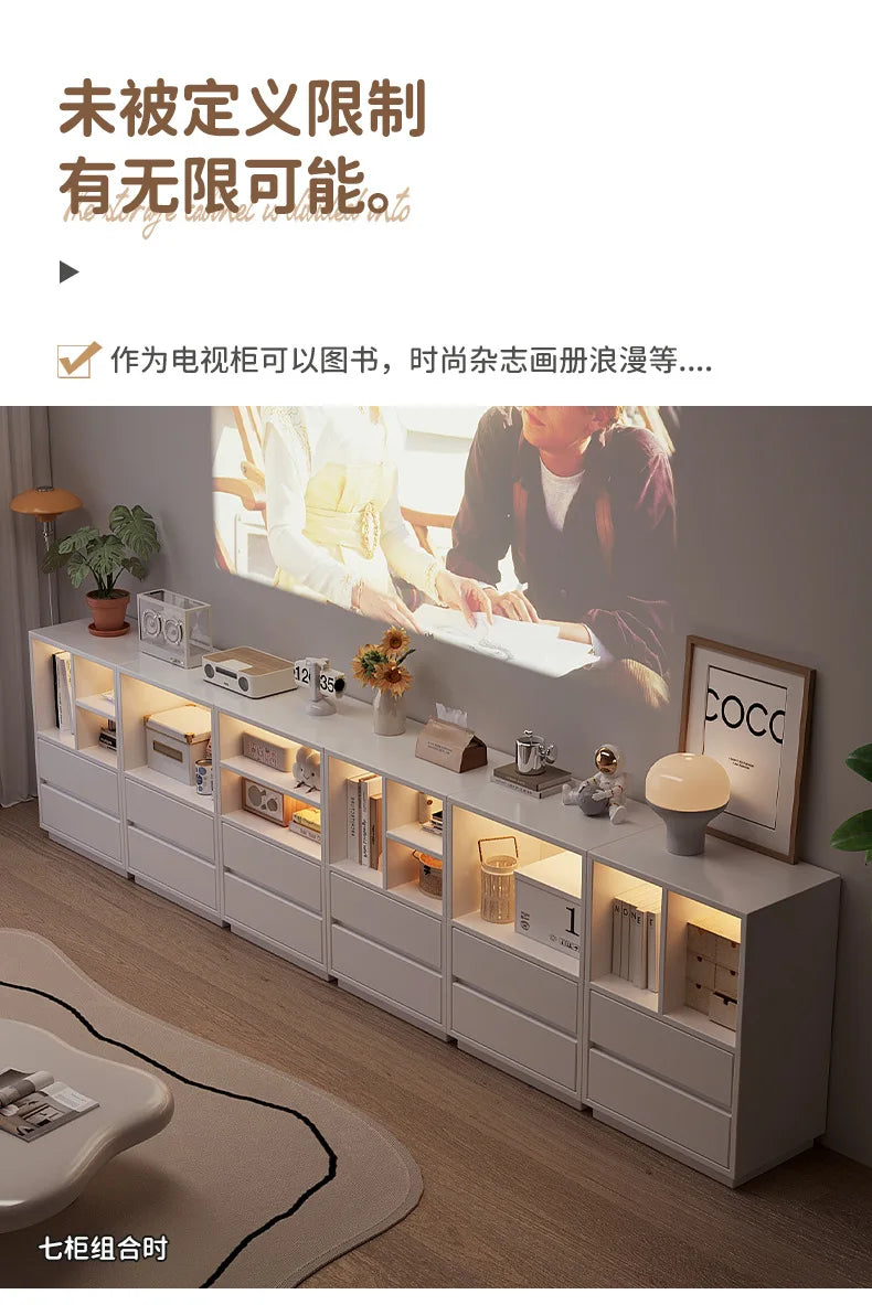 Modern minimalist white storage cabinet with display shelves & drawers. Versatile modular shelving unit for living room furniture.